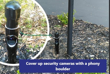 Cover up security cameras with a phony boulder